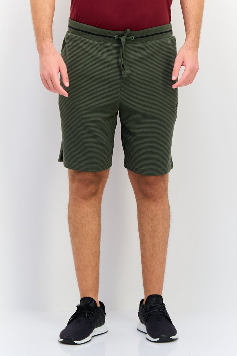 PUMA شورتات رياضية للرجال برباط سحب، خارجي، أخضر - Image 1