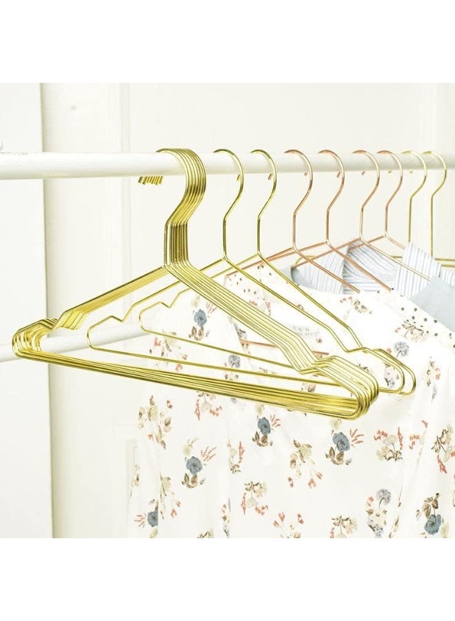 Pack of 10 gold metal hangers for stylishly organizing clothes. - Image 3