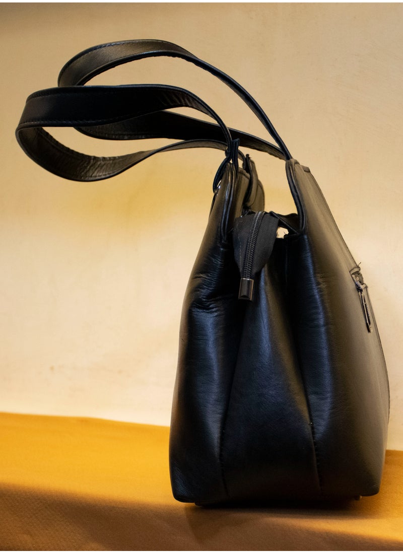 📌 Large Black Genuine Leather Bag – Spacious, Smart & Stylish  🖤 Color: Classic Black  📏 Size: 30×25×10 cm – roomy without being bulky  💼 Made from 100% genuine leather – handcrafted with care  🧵 Features: 3 outer zippers + 3 inner compartments + magic zipper + handle + crossbody strap  ✔️ Ideal for work, travel, or everyday use  ✔️ Functional design meets timeless style    📦 Available now – Delivery all over Egypt  - Image 3