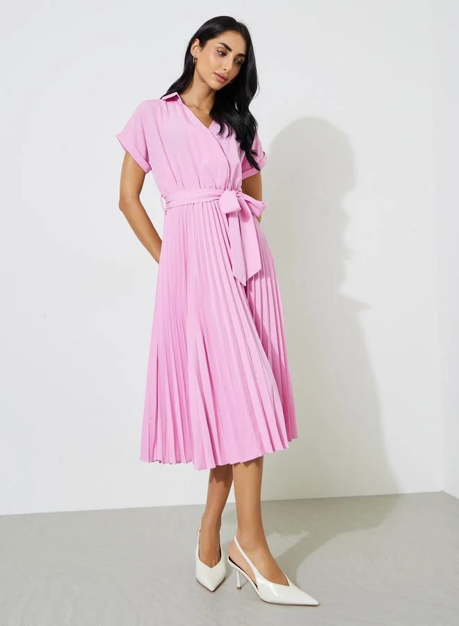ستايلي Pink Solid Pleated Tie-Up Details Wrap Midi Dress
