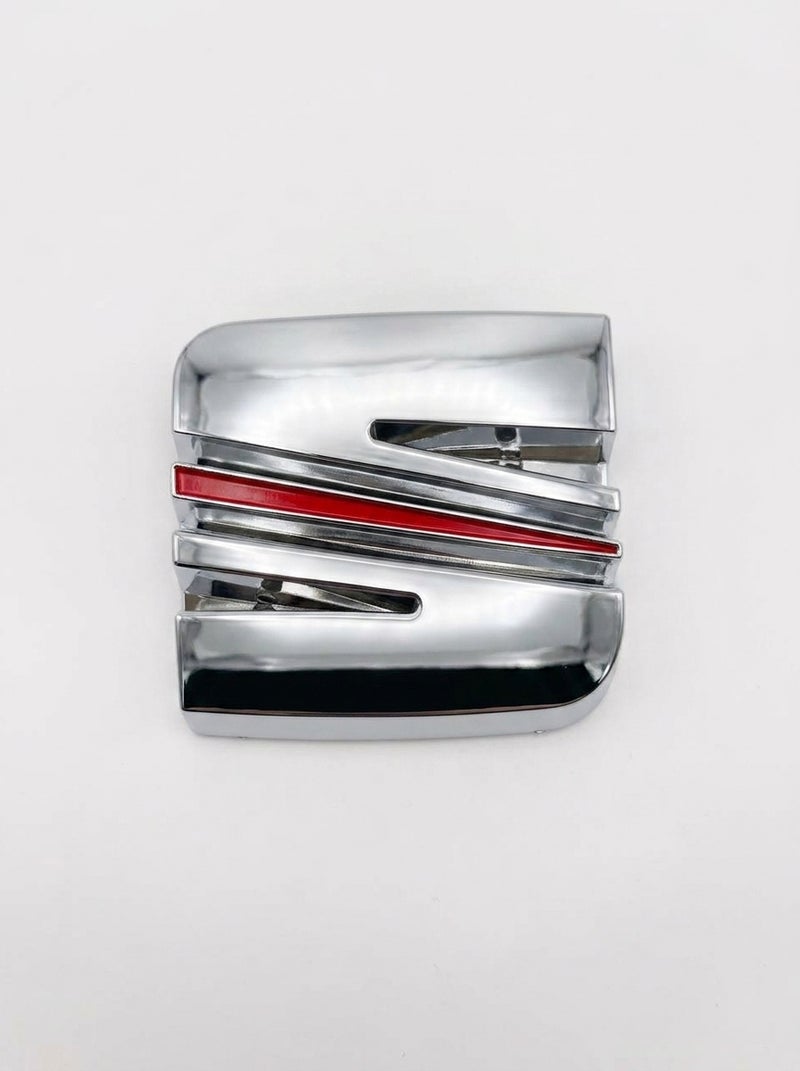 Chrome Car Emblem with Red Accents - Stylish Automotive Decor for Exterior Customization - Image 1