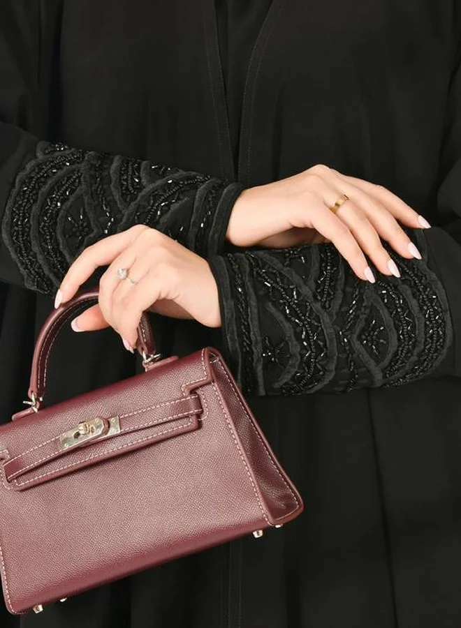 عبايات حوراء عباية لف سوداء  بتصميم بشت مزينة بشك اسود أنيق على الاكمام