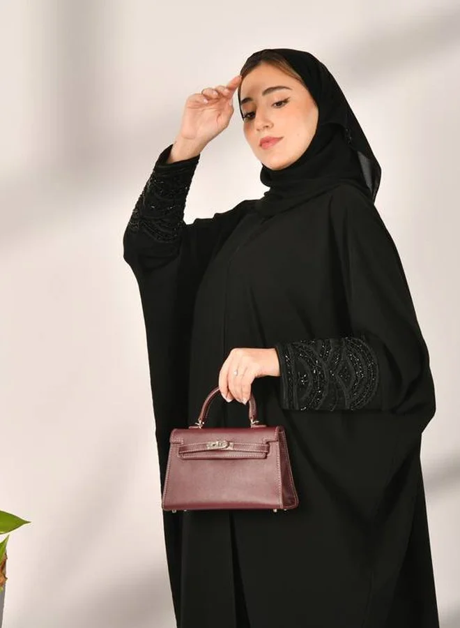 HAWRAA ABAYA Black wrap abaya with a bisht design, decorated with an elegant black check on the sleeves