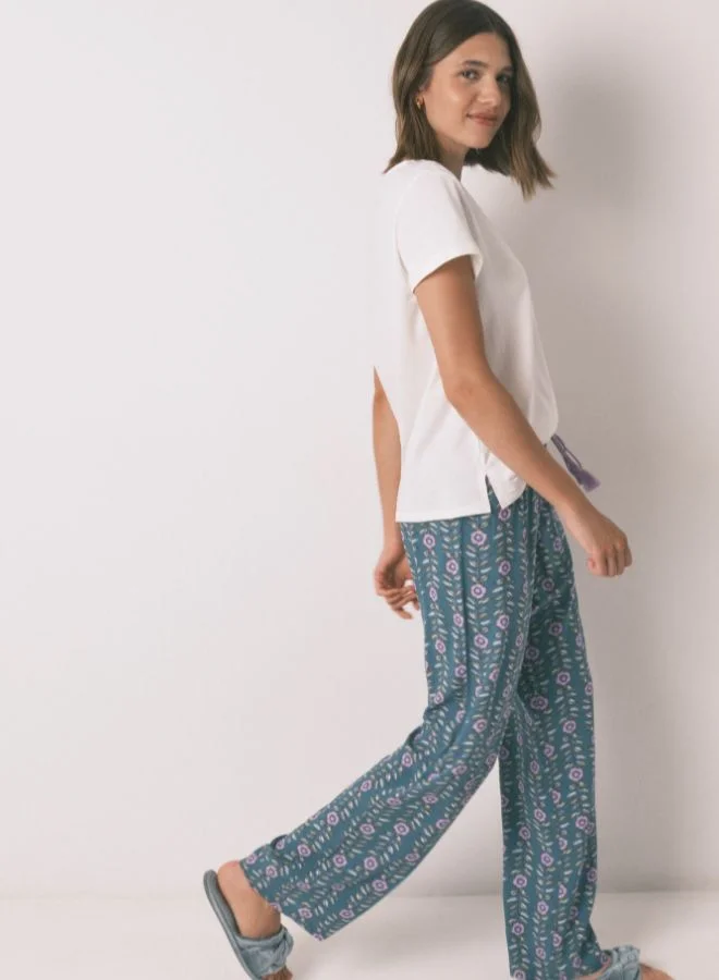 ومن سيكريت بنطال طويل بطبعة زهرة من الفيسكوز