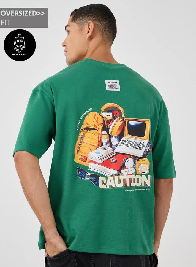 Styli Men Green Graphic Print Dropped Shoulder Oversized T-Shirt