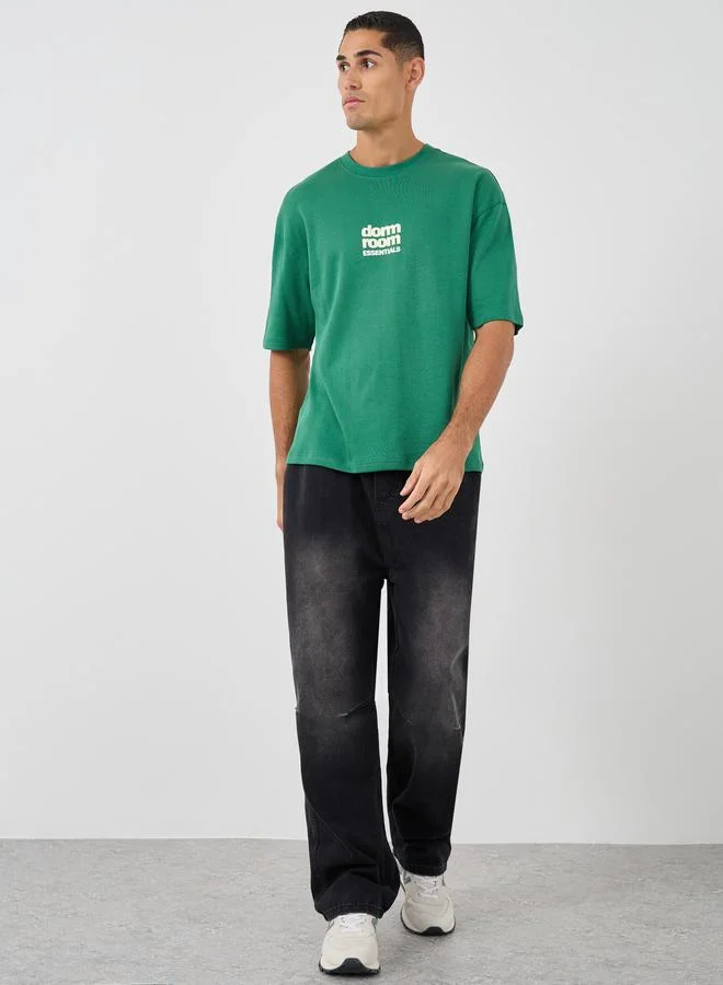 Styli Men Green Graphic Print Dropped Shoulder Oversized T-Shirt