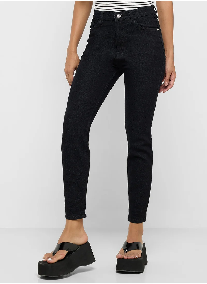 جينجر High Rise Skinny Jeans