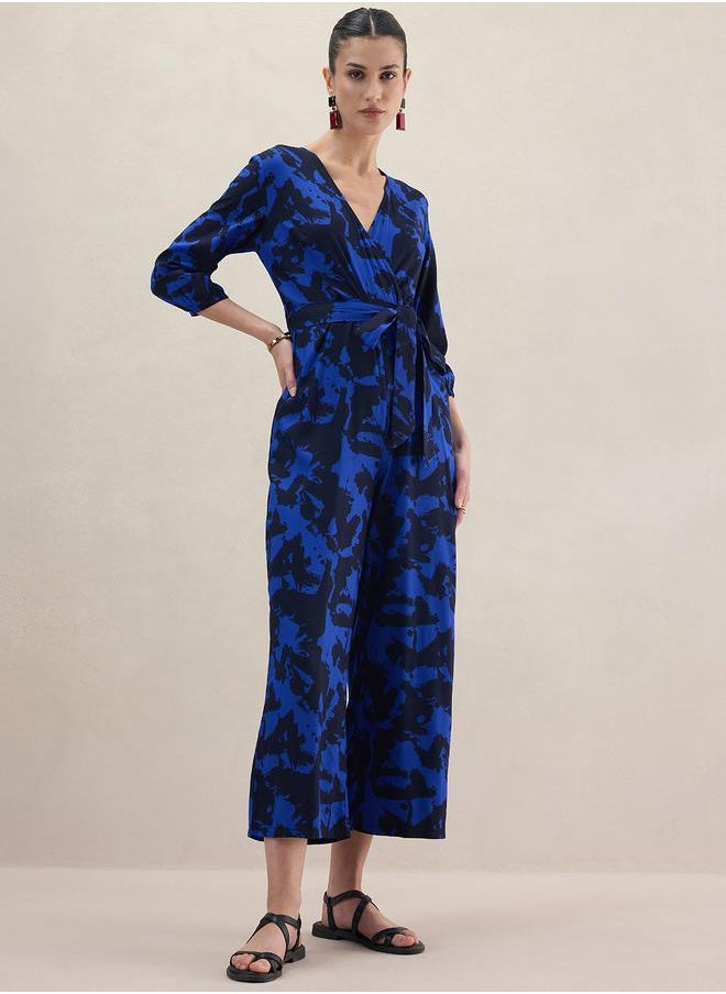 FEMELLA Abstract Print V Neck Wrap Jumpsuit by Styli  - Image 1