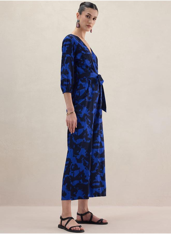FEMELLA Abstract Print V Neck Wrap Jumpsuit by Styli  - Image 2