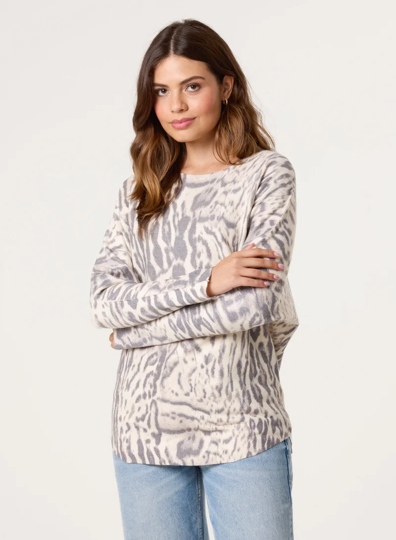 بلو فانيلا كنزة بطبعة جلد الفهد