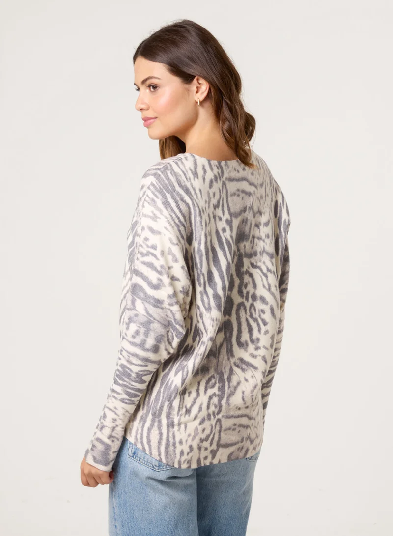 بلو فانيلا كنزة بطبعة جلد الفهد