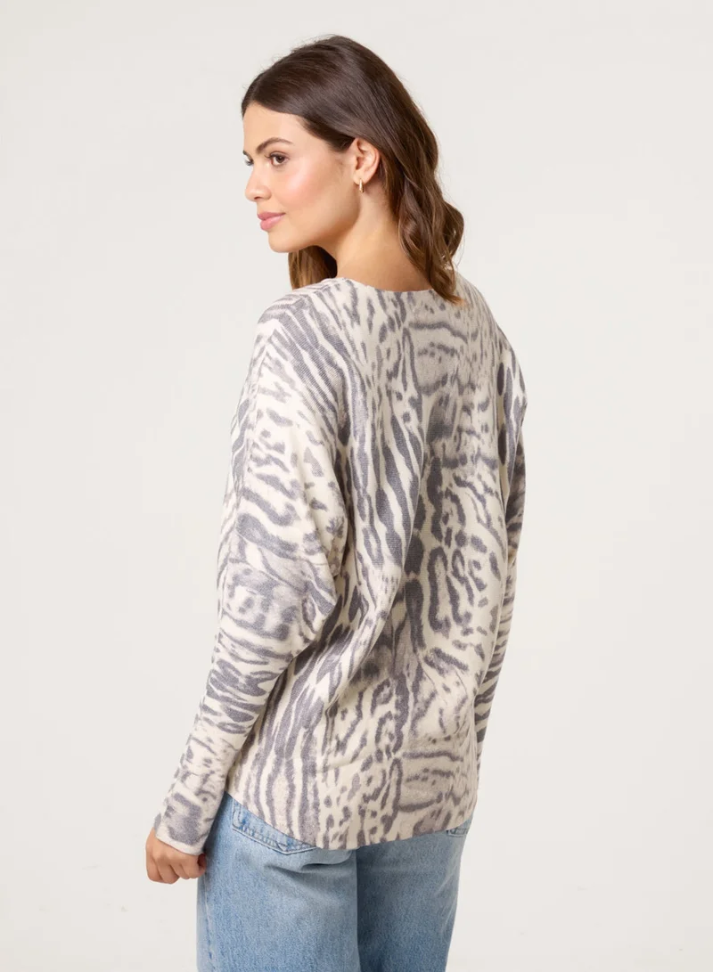 بلو فانيلا كنزة بطبعة جلد الفهد