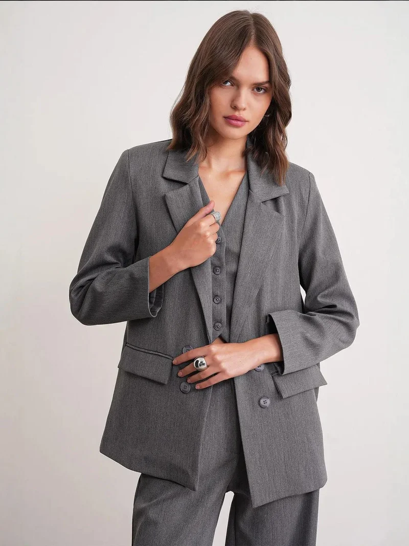 ميكسراي بليزر بأكمام طويلة وجيوب من ميكسراي