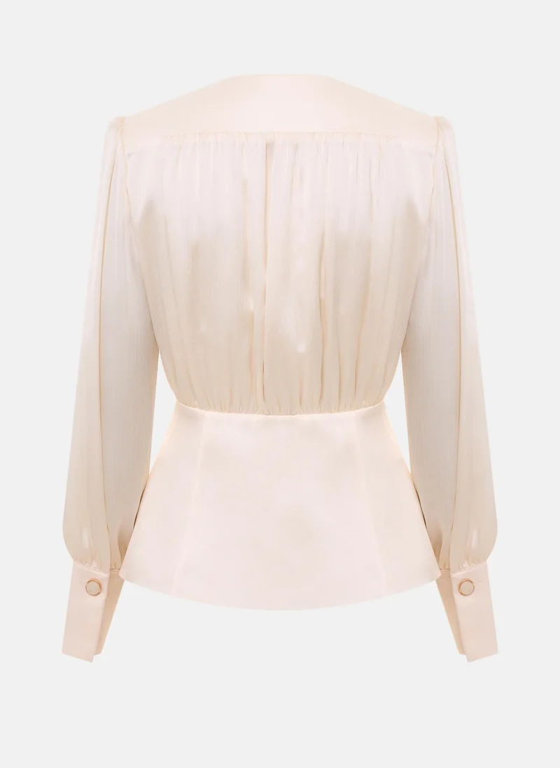 Lichi Flowing blouse with a waistband and large buttons