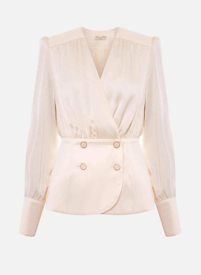 Lichi Flowing blouse with a waistband and large buttons