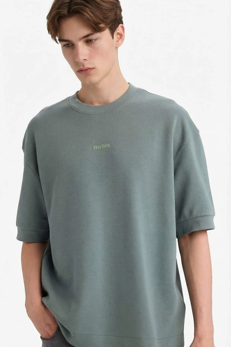 ديفاكتو Loose Fit Crew Neck Short Sleeve Printed T-Shirt