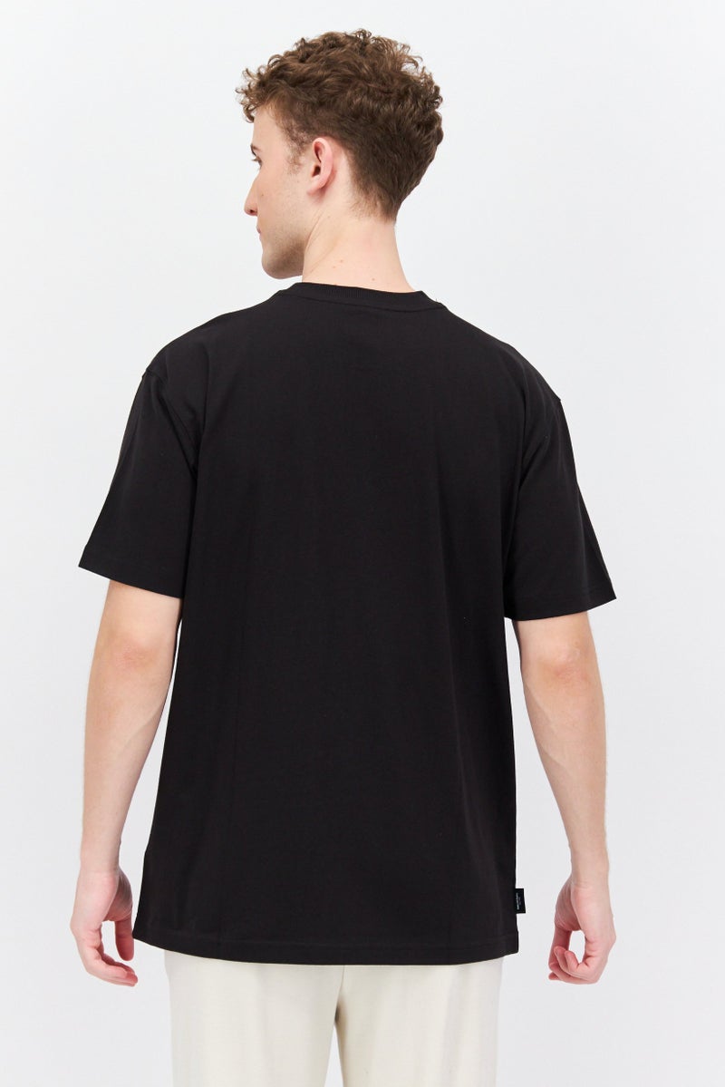 PUMA تي شيرت رجالي بقصة مريحة بأكمام قصيرة للخارج، أسود - Image 2