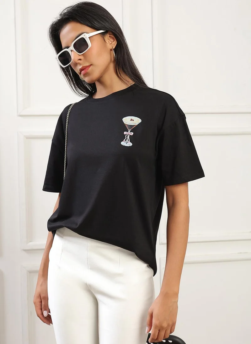 جلو باص Globus Women Black Round Neck Drop Shoulder Sleeves Graphic Back Print Oversized T-Shirt