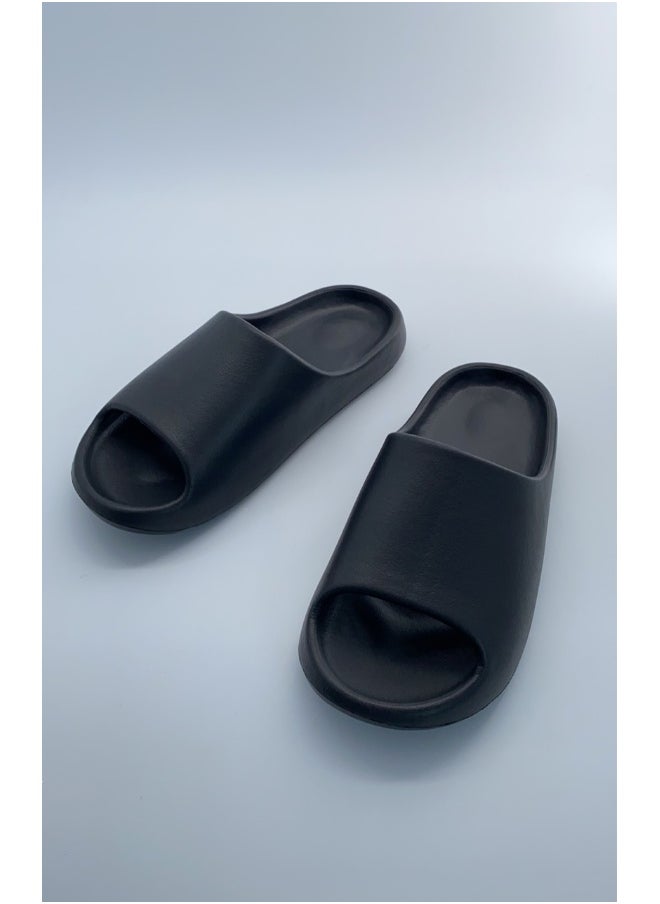 Miniso Enjoy all-day comfort with these black coconut cushioned thick slippers, size 39-40. 