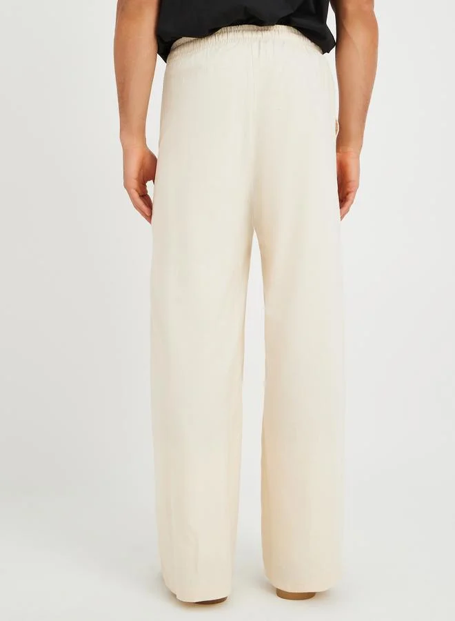 Styli Styli Men Solid Drawstring Waistband Oversized Trousers