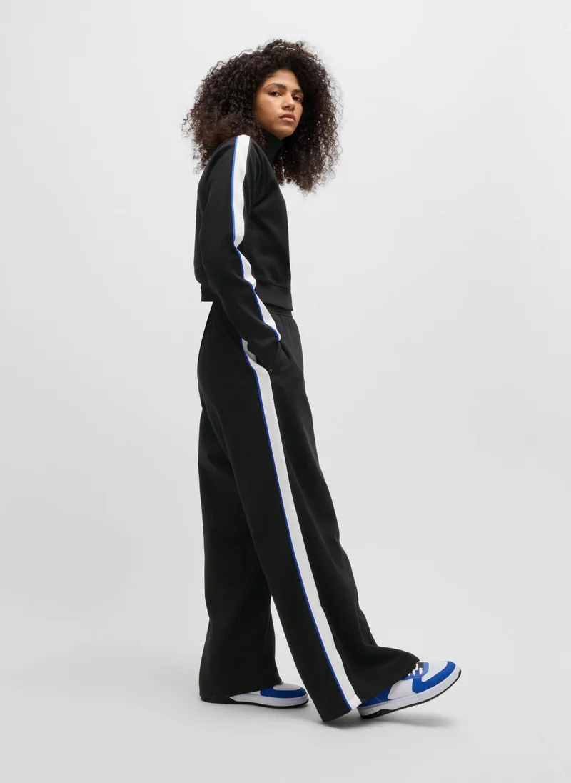 هوجو Wide-leg stretch-cotton tracksuit bottoms with logo tape