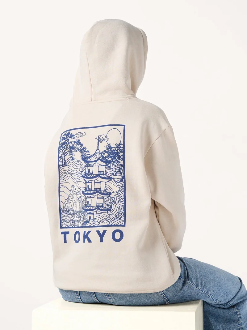 Outzidr  Cream Back Tokyo Graphic Russian Fleece Hooded Sweatshirt for Women | Best Price UAE