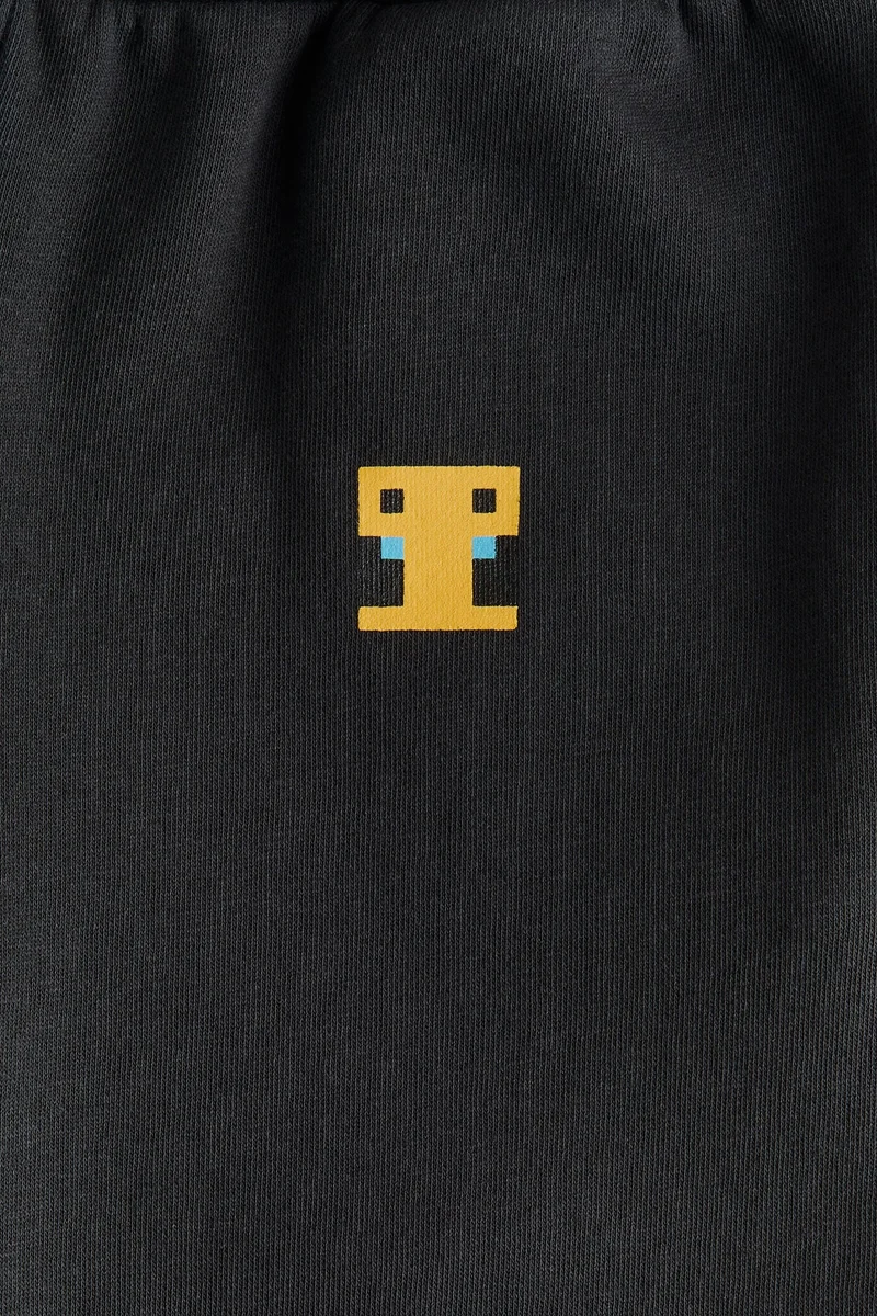 اتش اند ام بنطلون رياضي من القطن بتصميم مطبوع