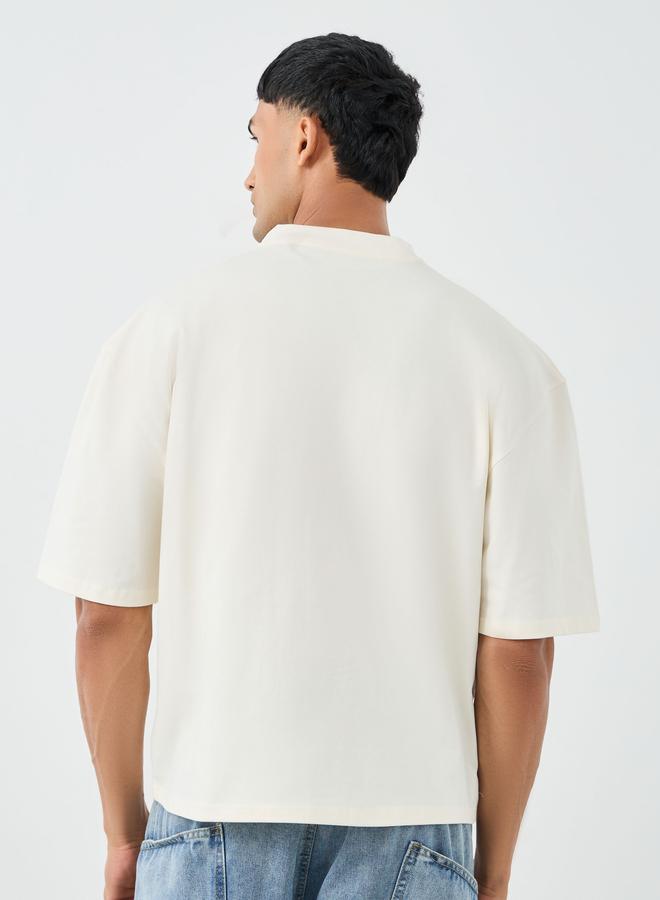 ستايلي تيشيرت بقصة بوكسي وتفاصيل مُطرزة - Image 5