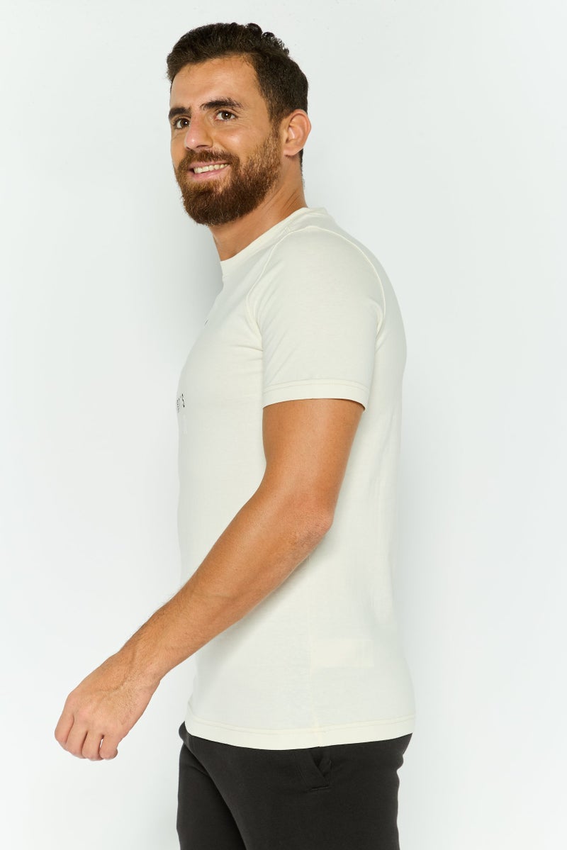 PUMA Men Sportswear Fit Short Sleeves Brand Logo Outdoor T-Shirt, Ivory - Image 2