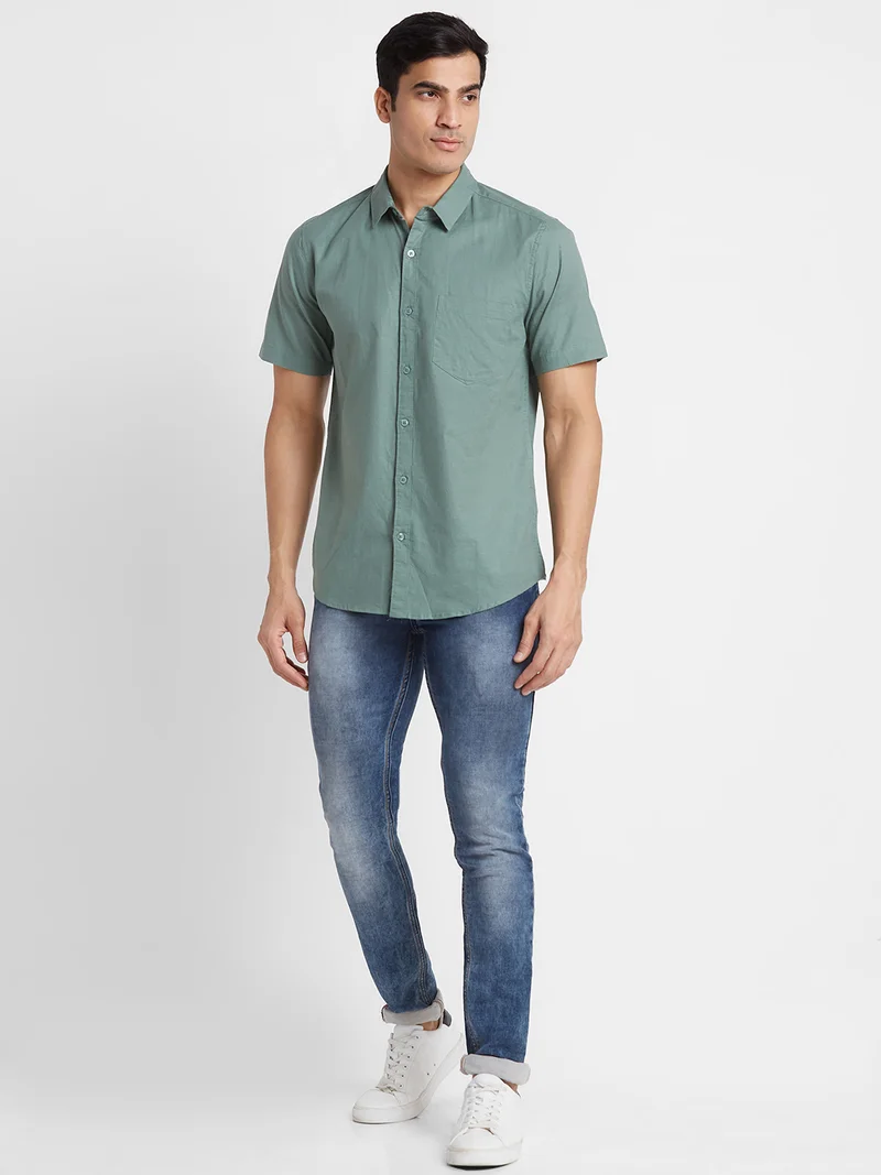 جلو باص قميص رجالي قطن سادة زيتوني بقصة عادية كاجوال