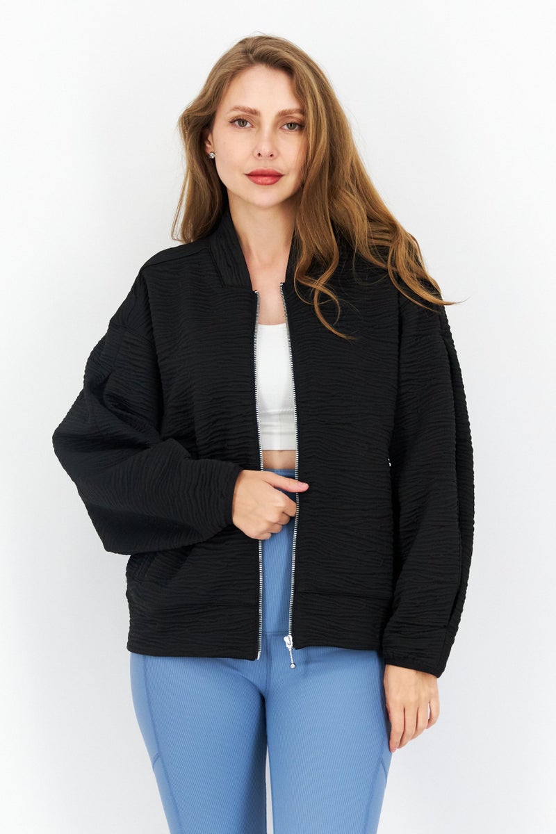 PUMA Women Sportswear Fit Long Sleeve Outdoor Bomber Jacket, Black - Image 1