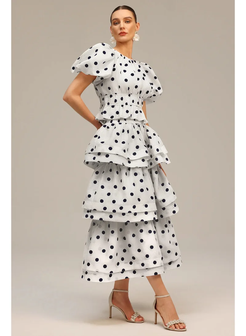 بيلا بارنيت طقم نسيم من قطعتين، بلوزة وتنورة بأكمام منفوخة وطبعة منقطة