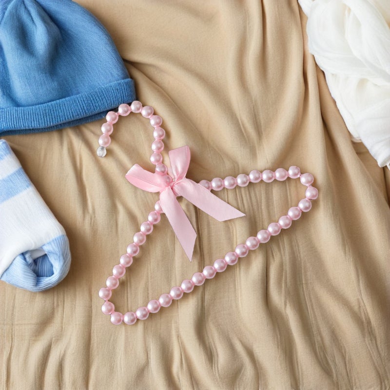 🧸 طقم علاقات ملابس أطفال بلاستيكية ملونة مزينة بحبات للتنظيم اليومي - Image 2