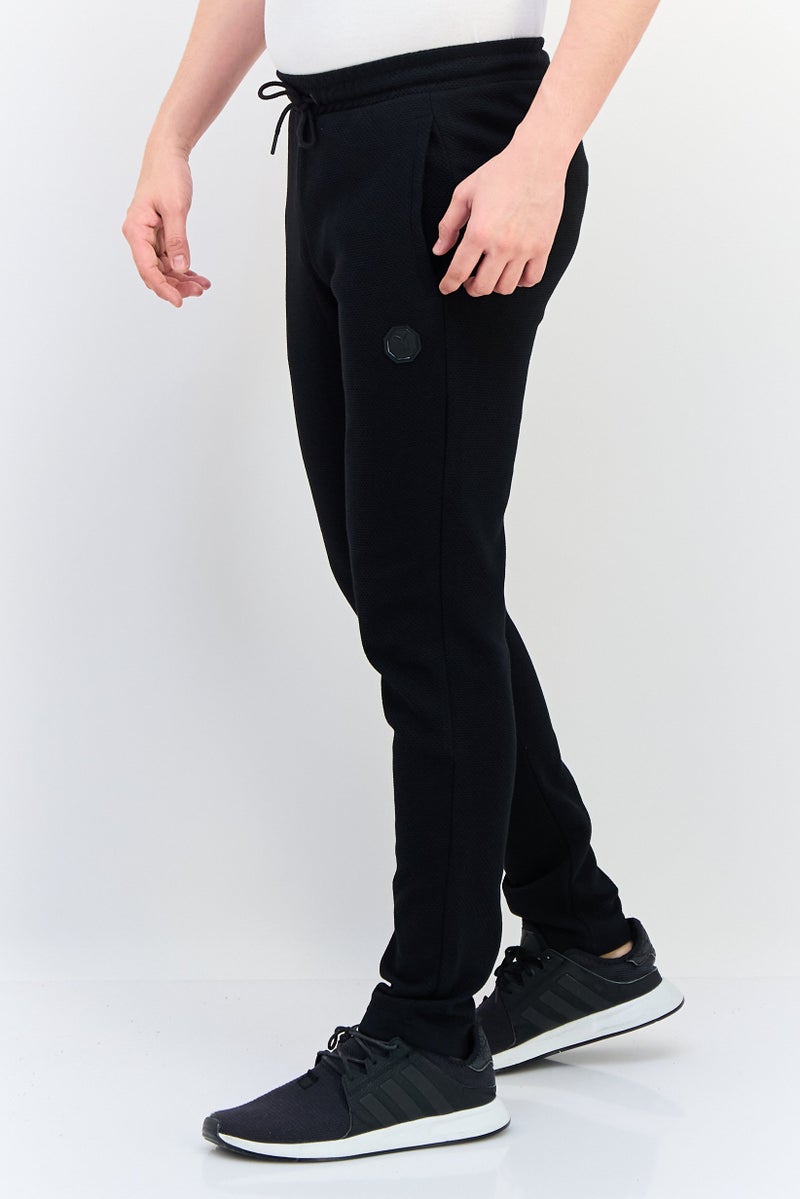 PUMA سروال رياضي خارجي ضيق من بومة x وان للرجال بشعار العلامة التجارية، أسود - Image 3