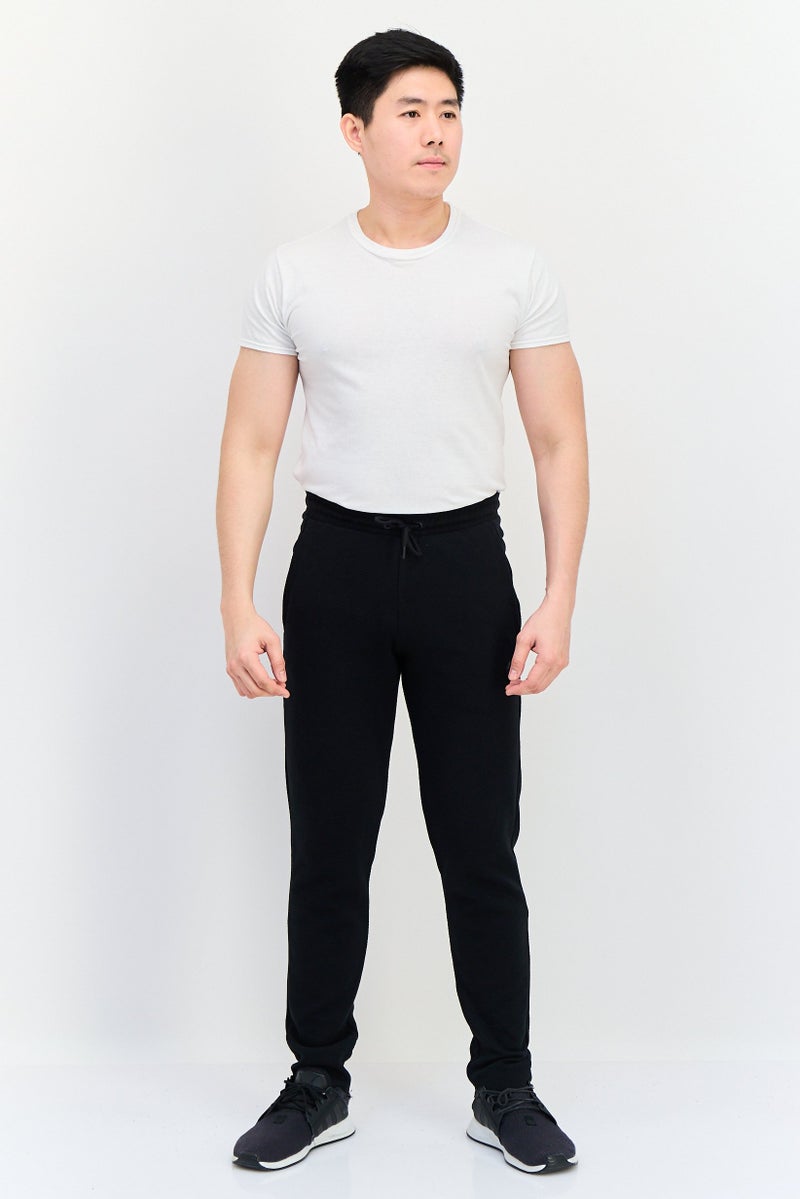 PUMA سروال رياضي خارجي ضيق من بومة x وان للرجال بشعار العلامة التجارية، أسود - Image 2