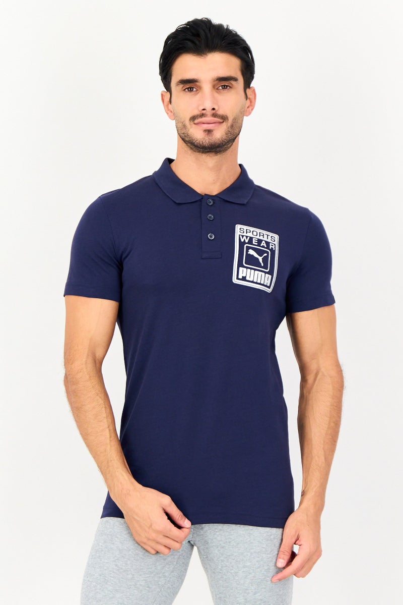 PUMA Men Sportswear Fit Short Sleeve Outdoor Polo Shirt, Navy - Image 1