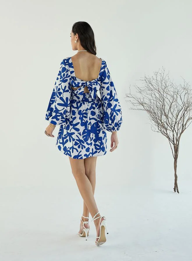 SASSAFRAS All Over Print Back Tie Knotted Flare Mini Dress by Styli