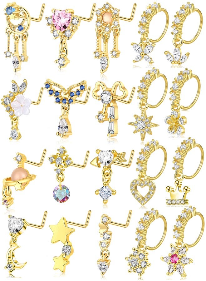 تورنيتو مجموعة تورنيتو من 20 قطعة من حلقات الأنف المتدلية للنساء، مقاس 20 غرام، بتصميمات متنوعة: حلقات على شكل حرف L، فراشات، قلوب، هلال، أسهم، زهور، نجوم، ربطات عنق، مرصعة بالزركونيا المكعبة، مجوهرات ثقب الأنف والجسم، مطلية بالذهب. - Image 1