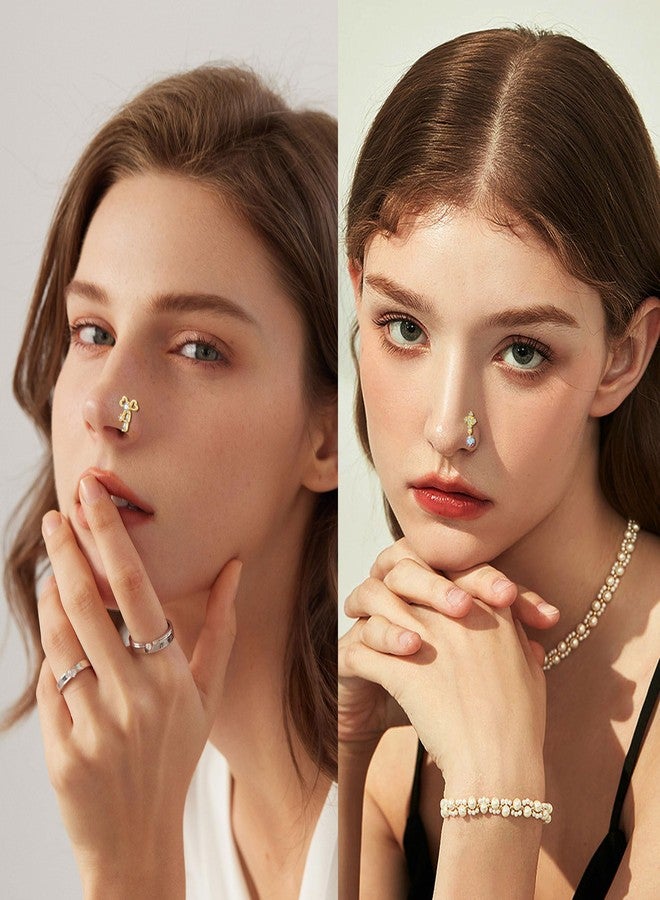 تورنيتو مجموعة تورنيتو من 20 قطعة من حلقات الأنف المتدلية للنساء، مقاس 20 غرام، بتصميمات متنوعة: حلقات على شكل حرف L، فراشات، قلوب، هلال، أسهم، زهور، نجوم، ربطات عنق، مرصعة بالزركونيا المكعبة، مجوهرات ثقب الأنف والجسم، مطلية بالذهب. - Image 5