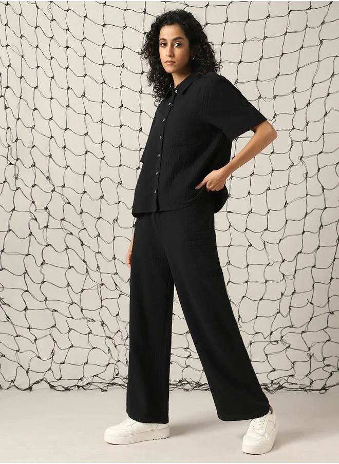 هوبرهولمي Women Co-ord in Black featuring Oversized fit with a solid pattern, spread collar collar, spread collar neckline, half sleeves, regular length, secured with button closure, crafted from cotton – crafted for those who appreciate style and comfort.