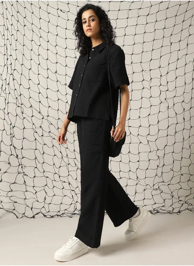 هوبرهولمي Women Co-ord in Black featuring Oversized fit with a solid pattern, spread collar collar, spread collar neckline, half sleeves, regular length, secured with button closure, crafted from cotton – crafted for those who appreciate style and comfort.