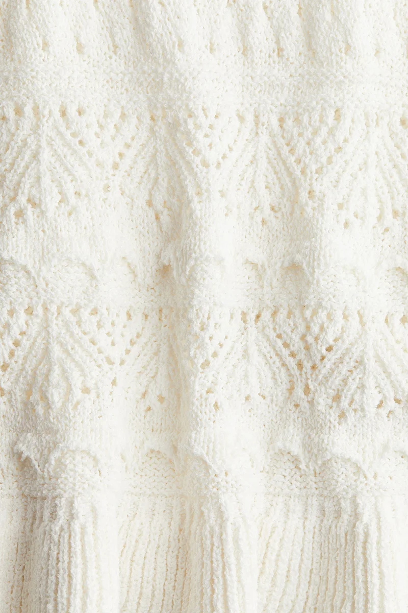 اتش اند ام كنزة من خامة بثقوب مع شراشيب