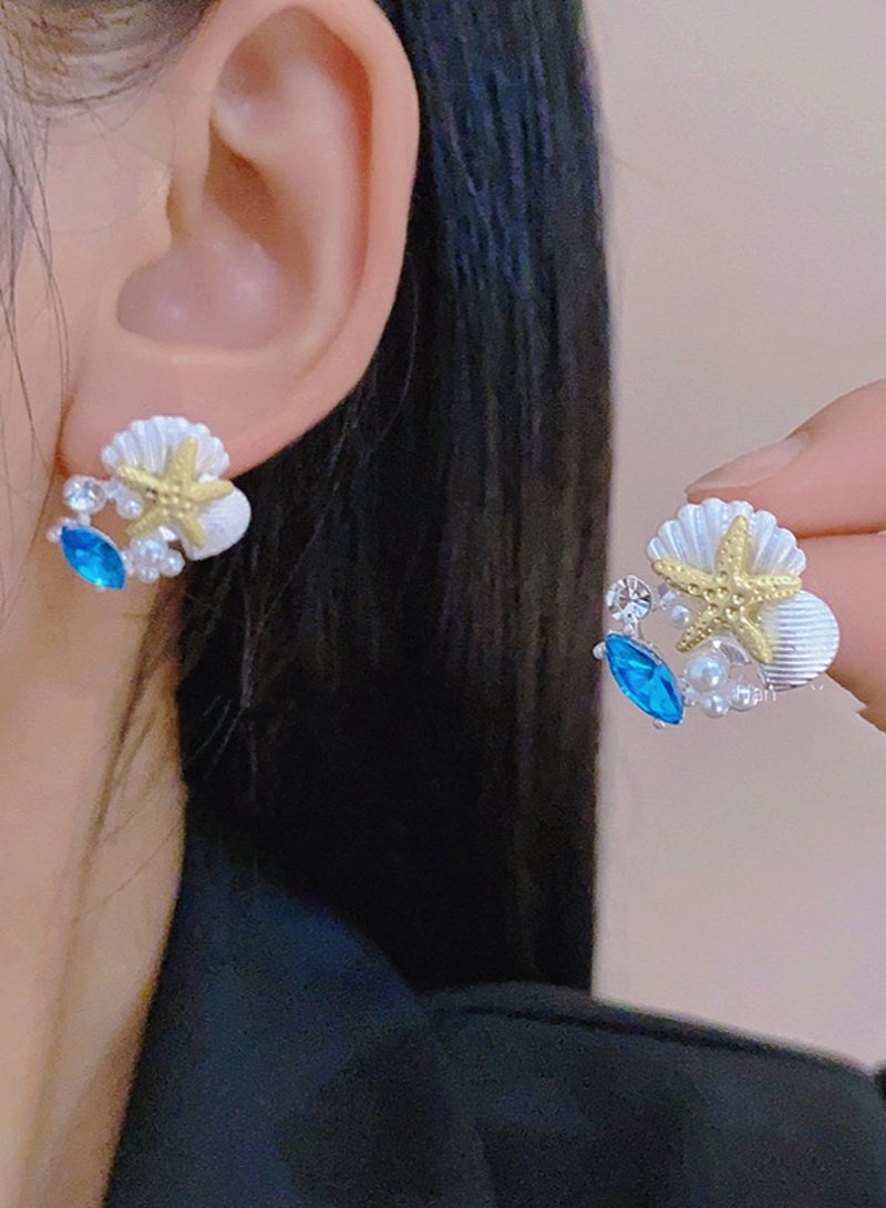 القرط الفضي بتصميم قرنة البحر واللؤلؤ - Image 1