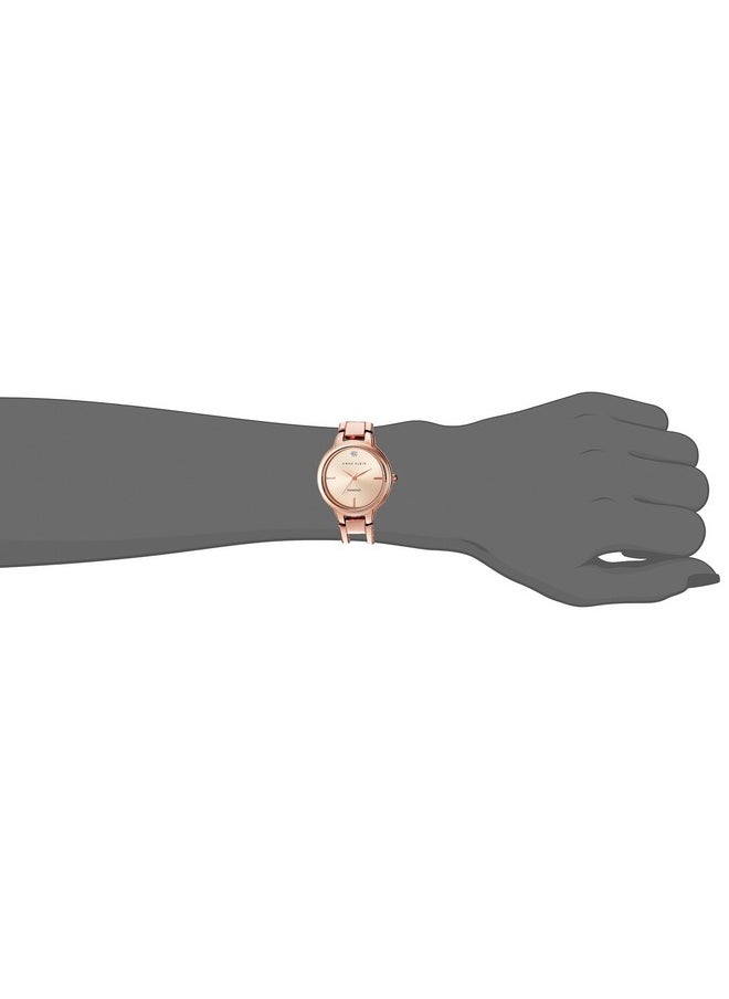 ANNE KLEIN - Anne Klein Women's AK/2626RGRG Diamond-Accented Dial Rose Gold-Tone Open Bangle Watch - Image 1