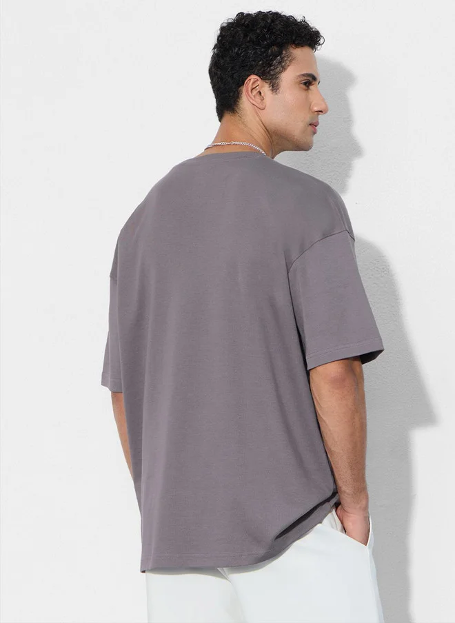 The Souled Store  The Souled Store Men's Oversized Fit Printed Grey T-Shirt with Ghost Logo  | Best Price UAE