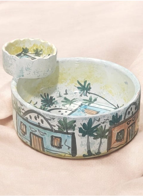 Hand-painted pottery and porcelain sauce bowl casserole that can withstand direct and indirect heat, flame or oven.