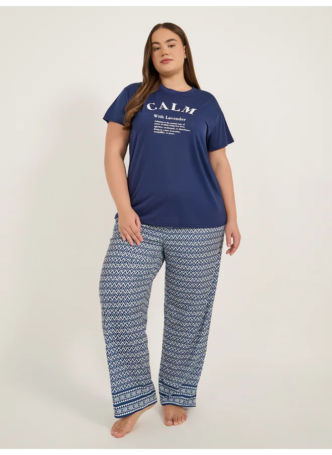 Styli Styli Unwind Plus Size Calm Slogan Print T-Shirt and Aztec Print Pyjama Set