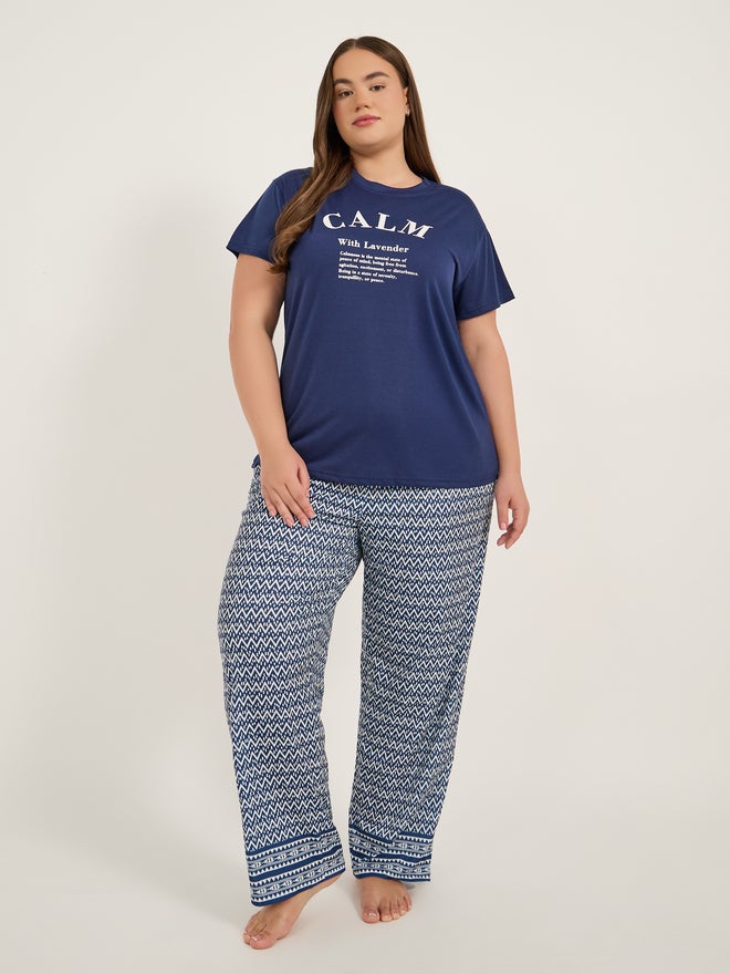 Styli Styli Unwind Plus Size Calm Slogan Print T-Shirt and Aztec Print Pyjama Set  - Image 1