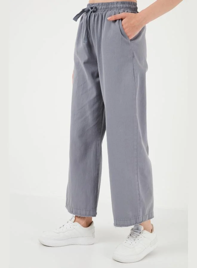 ليلا بنطلون نسائي واسع الساق بخصر عالٍ وحزام وجيوب