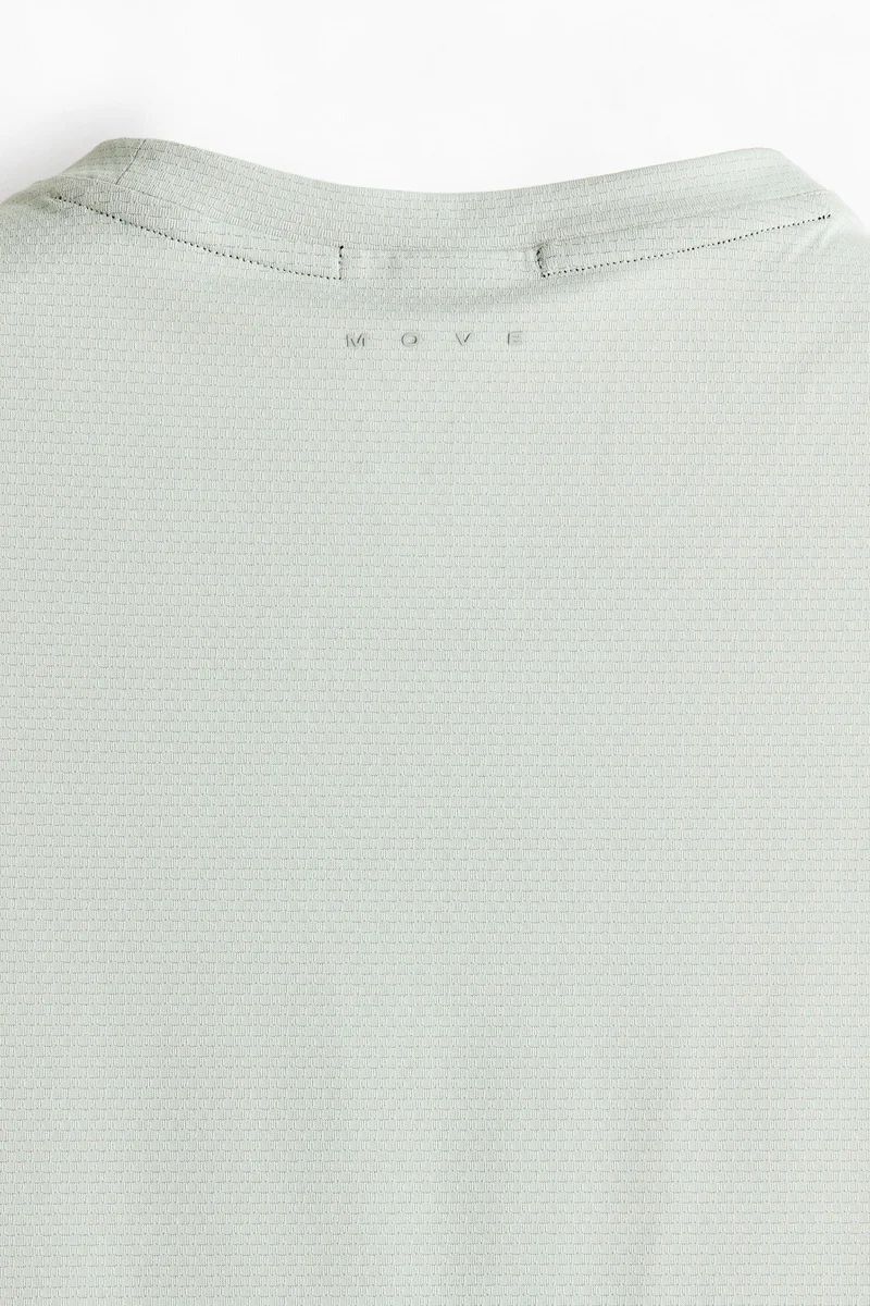 اتش اند ام بلوزة فيست رياضية بقصة عادية من نسيج دراي موف